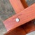 This exceptional square coffee table is a rare and highly collectible piece of british design history, handcrafted by the...