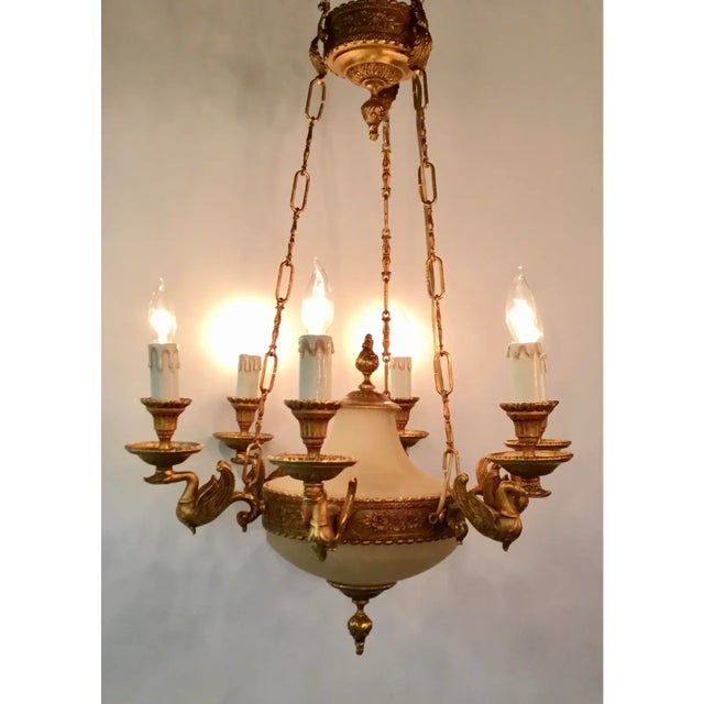 Original Retail $6765, elegant Myran Allan Luxury Lighting Empire Style Bronze Ormolu and Porcelain Chandelier, made in...