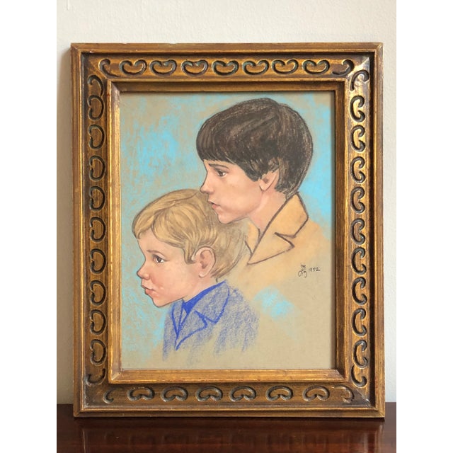 Offering an original pastel portrait of two handsome young brothers, signed and dated 1972. Beautifully rendered in...