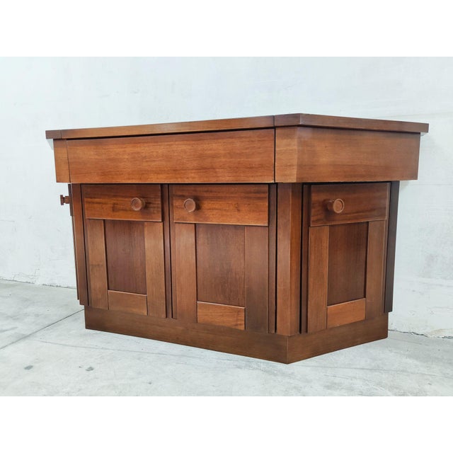 Bar sideboard by silvio coppola for bernini, all in walnut wood, 1960s dimensions: l. 190 x d. 55 x h. 91 cm this piece is...