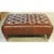 This piece features a deep brown leather surface with pronounced button tufting that creates a structured, grid‑like...