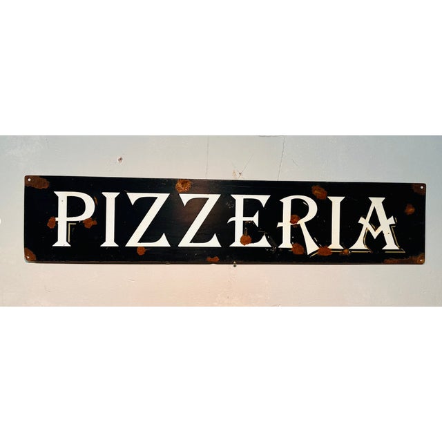 old pizzeria sign from the 1930s, recovered from a historic restaurant in Trastevere in the centre of Rome, they are two...