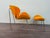 Armchair with matching footstool Pop Art style 1980s era The armchair is attributed to KARE DESIGN. The manufacturer's...