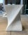 1980s postmodern plaster and glass end table, with sculptural twist pedestal base, manner of Sirmos. Piece dimensions:...