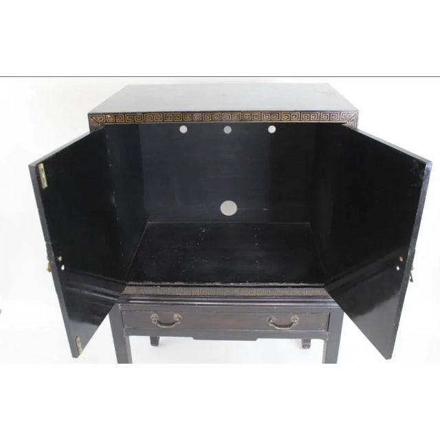 Perfect spot to hide your television, store your drinks tray and decanters or pile large unwieldy table clothes. Very...