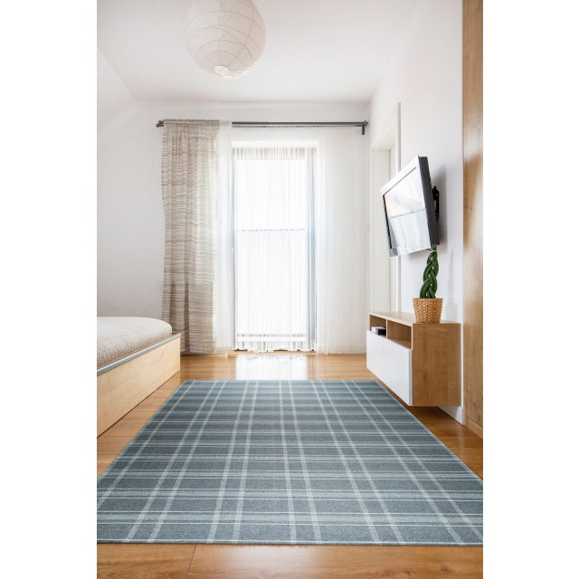 Graceful Quinn Gray Flatweave Wool Rug, Country of Origin: India. This exceptional piece is defined by its precise,...