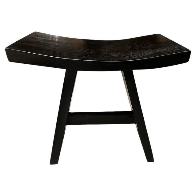 Sleek minimalist bench. Hand made from a single slab of reclaimed teak wood and finished with an espresso stain revealing...