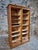 This vintage tambour cabinet originates from France and dates from the 1960s. Crafted from oak, the piece features a warm,...