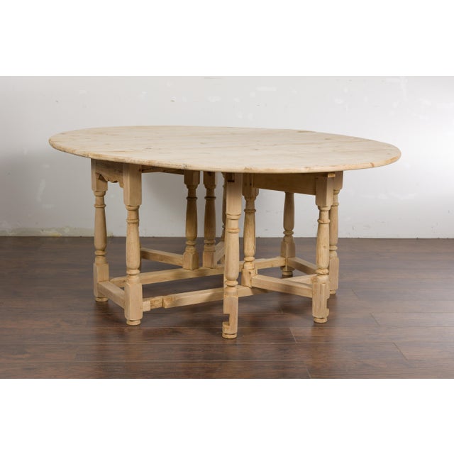 English Pine 19th Century Drop Leaf Table with Oval Top and Carved Apron For Sale - Image 4 of 12