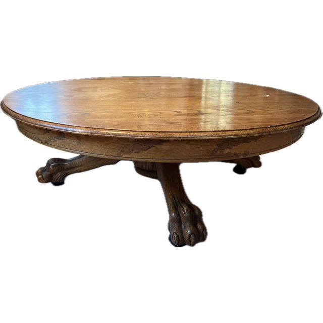 This 4 legged well oiled, well kept antique solid oak coffee table is 15" in height and comes with removable castors. No...