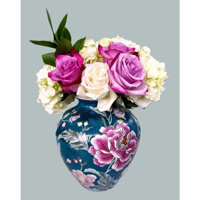 Vintage Chinese embossed vase with hand painted peonies. Gorgeous vibrant peonies against a dark green / teal backdrop....