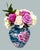 Vintage Chinese embossed vase with hand painted peonies. Gorgeous vibrant peonies against a dark green / teal backdrop....