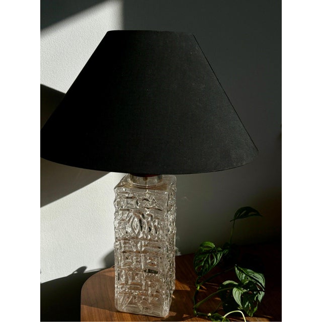 Large glass table lamp designed by Henrik Blomqvist for Stilarmatur, Tranås, Sweden. This is a lamp with a classic shape,...