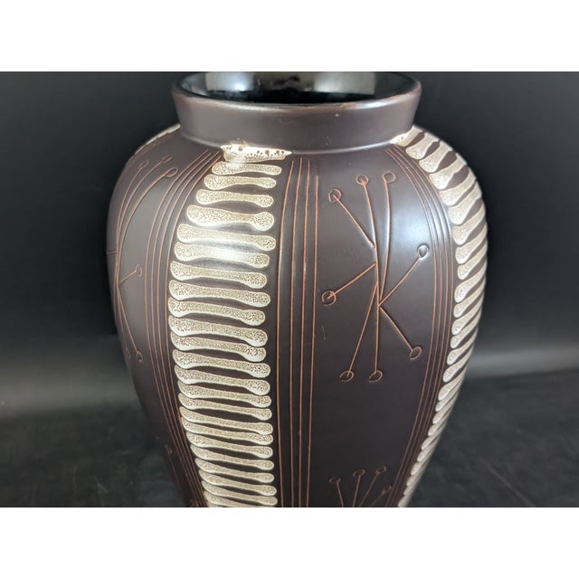 A wonderful handmade vase with an abstract modern design in the glaze. The bottom stamp translates to "A Kiln of Tokoname...