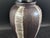 A wonderful handmade vase with an abstract modern design in the glaze. The bottom stamp translates to "A Kiln of Tokoname...