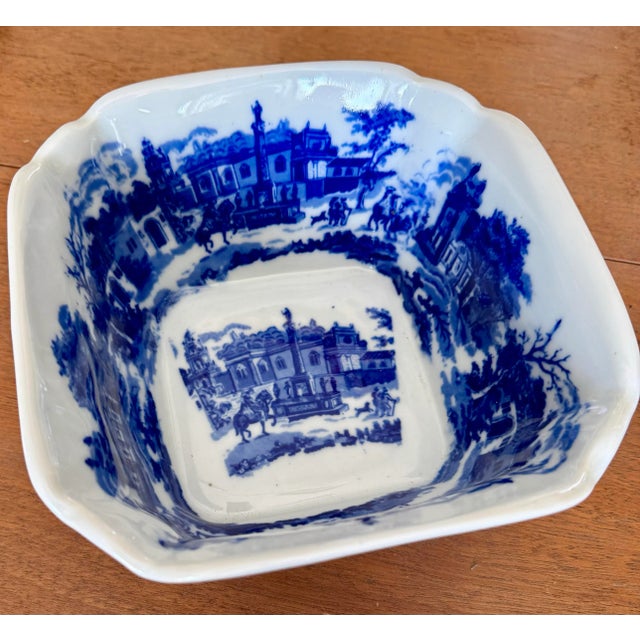 Blue and white vintage Chinoiserie transferware decorative bowl. Made in China on underside.