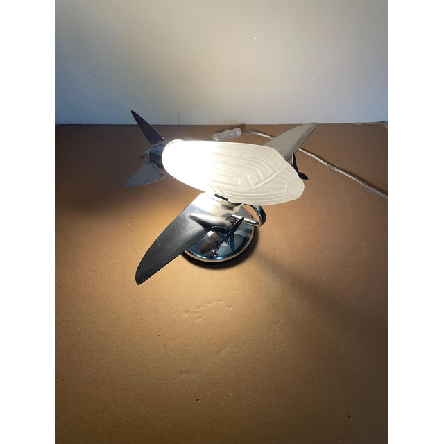 Airplane Lamp by Sarsaparilla, 1970s, in Very Good conditions. Designed 1970 to 1979 European Plug (up to 250V).The wiring...