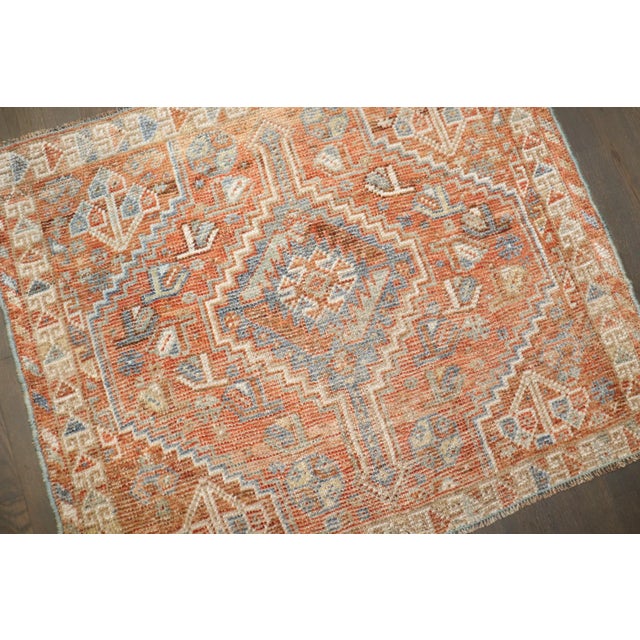 An early 20th-century small square Shiraz rug