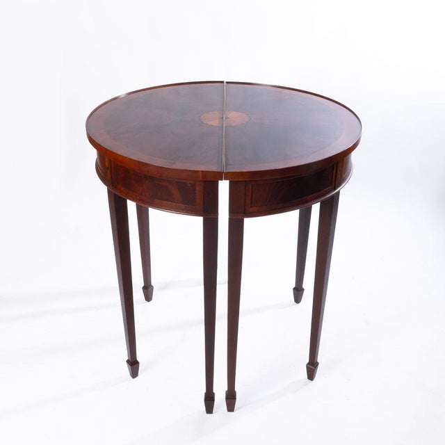 Pair of Hekman Demi Lune Tables. American made with fine details including sunburst top. great for entry way tables or put...