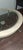 Maitland Smith Style Round Stone & Beveled Glass Coffee Table W/Burnished Silver Legs For Sale - Image 4 of 11