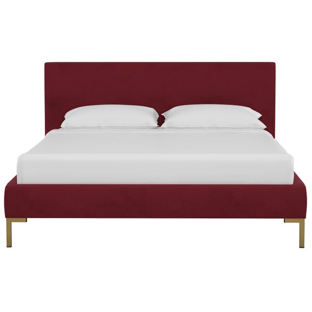 This low profile fully upholstered platform bed is a perfect piece for anyone looking to add a modern statement piece to...