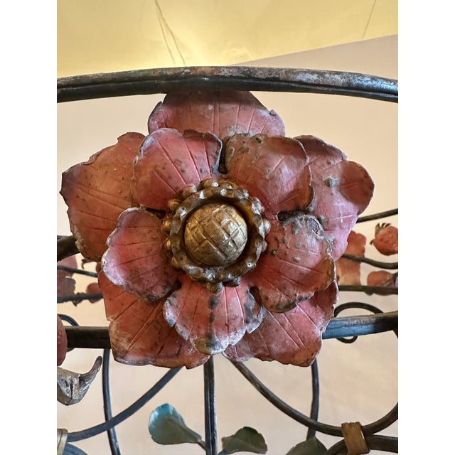 Lovely vintage Art Nouveau iron plant stand having floral decoration.