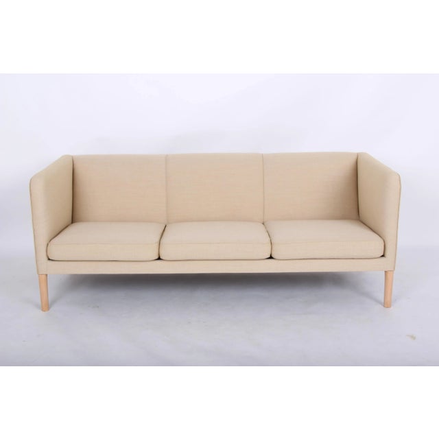 Refurbished hans j. Wegner sofa model ap18 manufactured by ap stolen. The sofa is equipped with new cushions in cold foam....