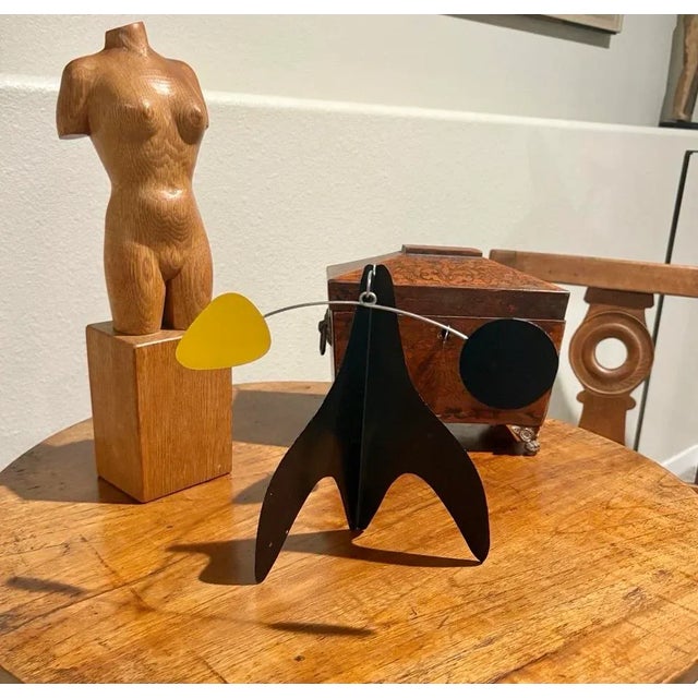 Handsome Mid-Century hand carved wood sculpture of an abstract female nude form. On a base of the same oak wood, standing...