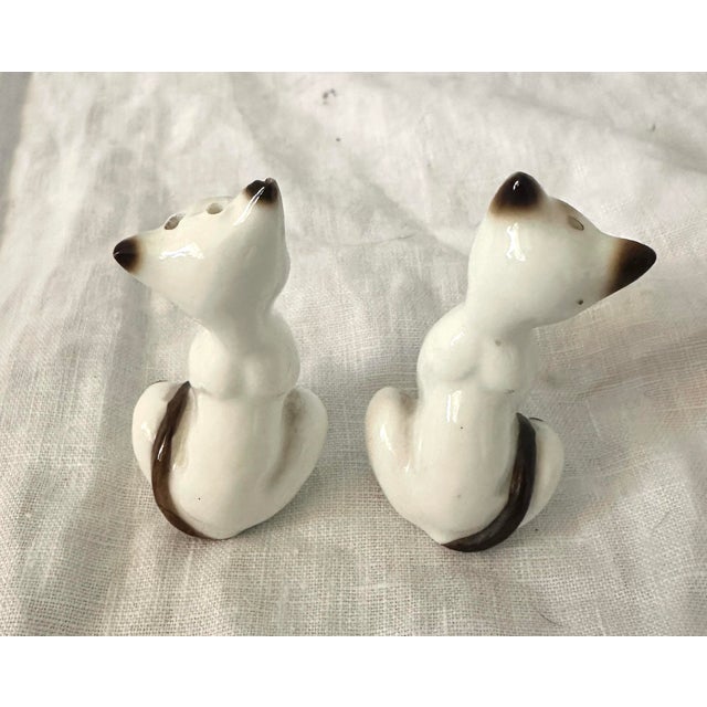 Vintage pair of Siamese Cat Salt & Pepper Shakers. Great for a collection or display, or for actual use. Super cute. These...