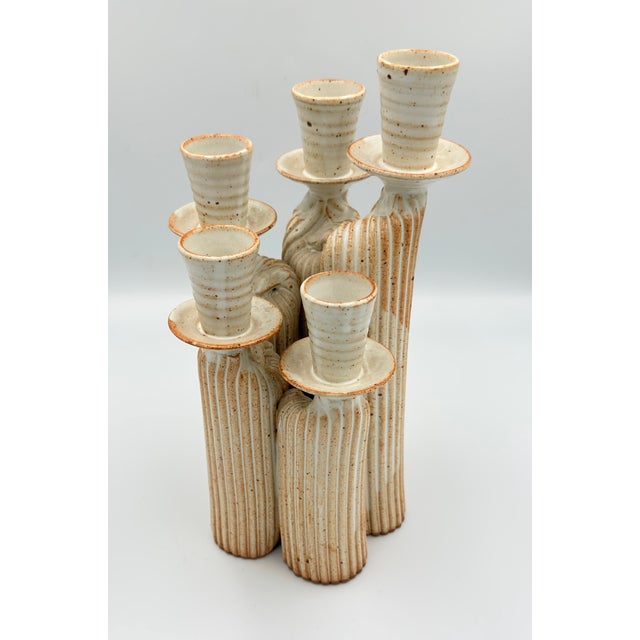 Discover this truly unique Modernist Studio Pottery Speckled Ceramic Candelabra, a captivating piece that will elevate any...