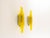 A pair of yellow handmade acrylic wall lamps. The sconces were designed by claus bolby and manufactured by his own...