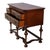 This antique Queen Anne style server, dating to approximately 1930, is crafted from banded mahogany. The server features a...