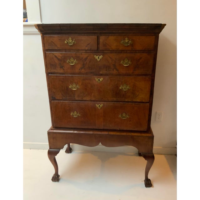 Antique Queen Anne Figured Walnut Chest on Frame ,carved paw feet,brass hardware. Early Georgian circa 1740.