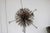 This brutalist metal round sculpture has an amazing patina and a very modern feel. The piece, composed of rusted nails,...