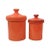 Mid-Century orange canisters in ceramic with a slightly speckled finish. The vintage canisters are a large size and in...