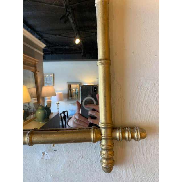 19th century French Faux Bamboo mirror. Would look amazing in a powder room. Touched up with gold leaf. Has hanging wire.