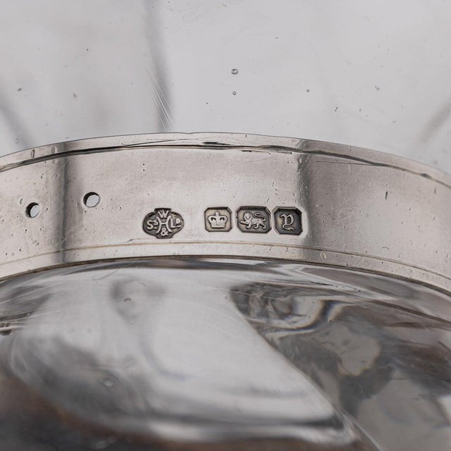 Antique early 20th century english solid silver & glass dog shaped claret jug. The jug features a meticulously crafted...