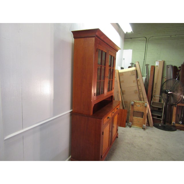Item : Eldred Wheeler custom made solid cherry and tiger maple Dutch style cupboard. Age: 1980's. Details: Two piece...