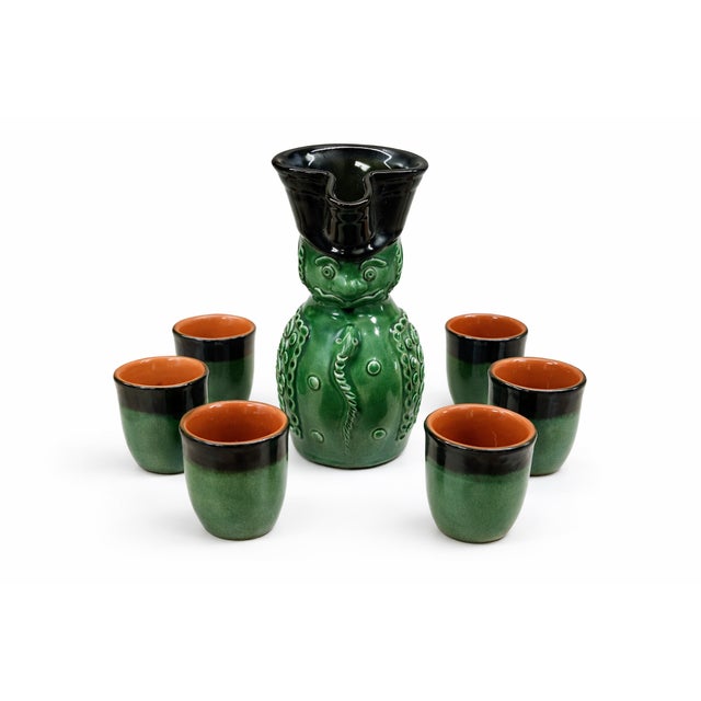 This rare vintage Hungarian ceramic decanter set dates from the 1960s and represents the playful yet sculptural spirit of...