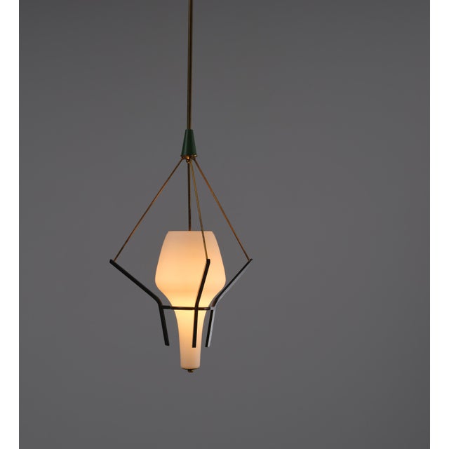 1950s Italian modernist chandelier in brass , enamelled black iron and opaline glass Original working wire The black end...