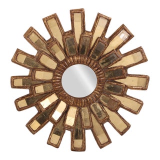 A Gold Glass and Resin Sunburst Mirror, in the Manner of Line Vautrin. For Sale