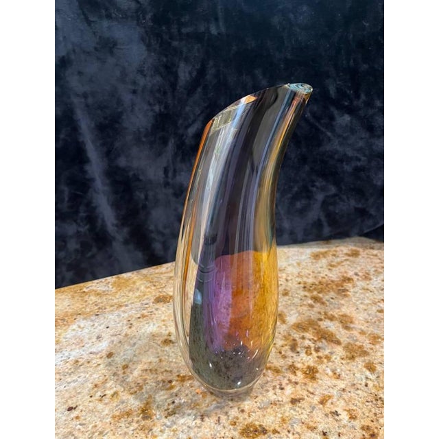 Each Orchid vase by Göran Wärff is free-mouth-blown in Kosta which makes it unique. These objects are part of Kosta Boda...
