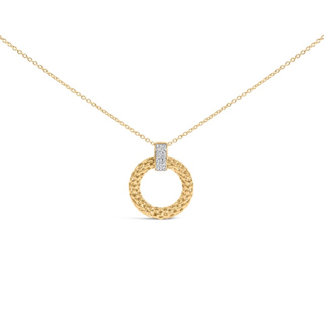 A luminous circle of confidence, this bold pendant celebrates modern elegance with a sculptural open design: three stacked...