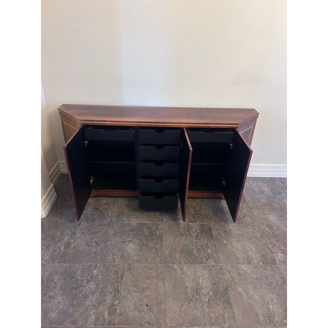 An exceptional handcrafted dining collection featuring an impressive 84-inch sideboard acquired through a premier luxury...