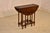 Late 19th century oak gate-leg side table rom England. The top, when open, measures 30.25 x 29.75, and has a lovely hand...