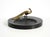 A beautiful, large granite valet tray (*Svuotatasche*) featuring a brass peacock. Original piece from around 1920; likely...