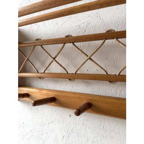 This large wall coat rack from the 1960s is constructed from oak and immediately stands out due to its carefully braided...