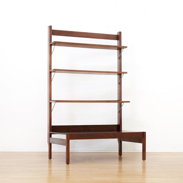 This mid-century bookcase room divider was designed by Eric Pamphilon and George Freyer for Guy Rodgers circa 1960s. A...