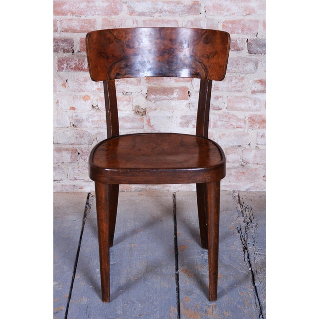 This set of 4 chairs is a magnificent and highly aesthetic showcase of furniture design from the transitional period...