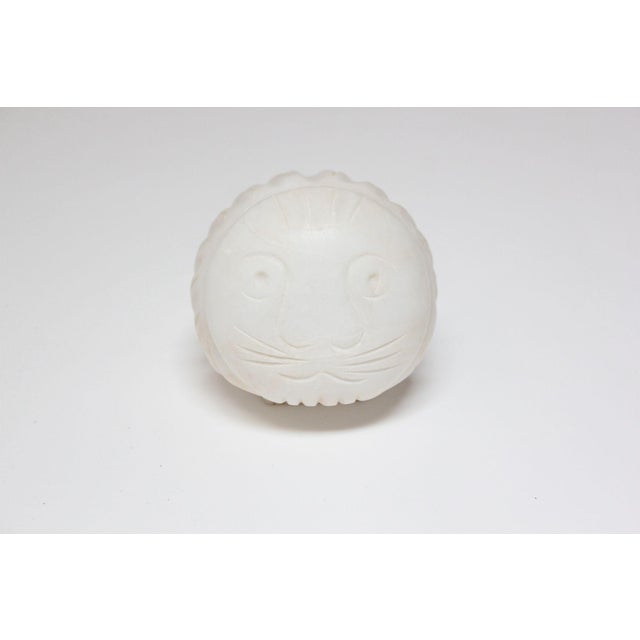 Charming alabaster lion figurine/paperweight (ca. 1960s, Italy). Minimalist form with carved facial, tail, and mane...